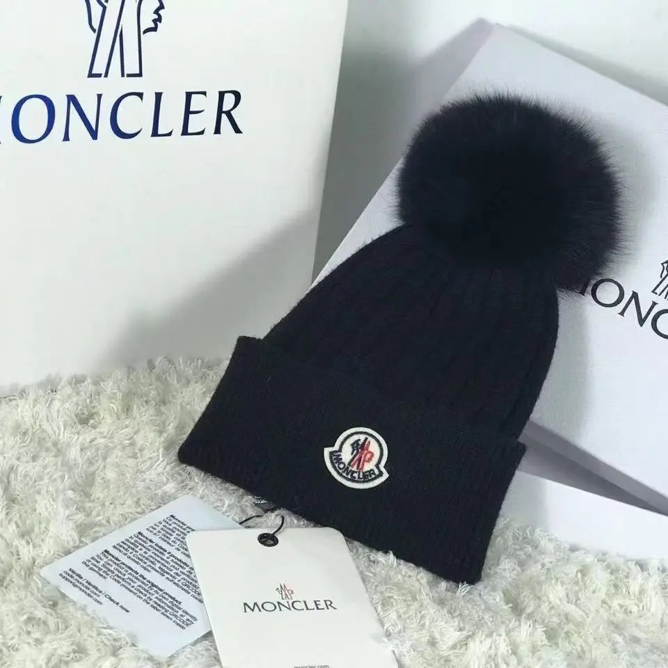 Moncler wollen muts met pompon