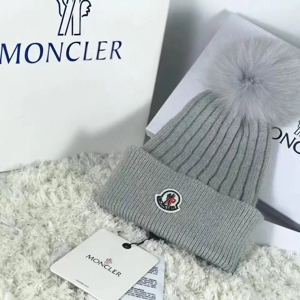 Moncler wollen muts met pompon